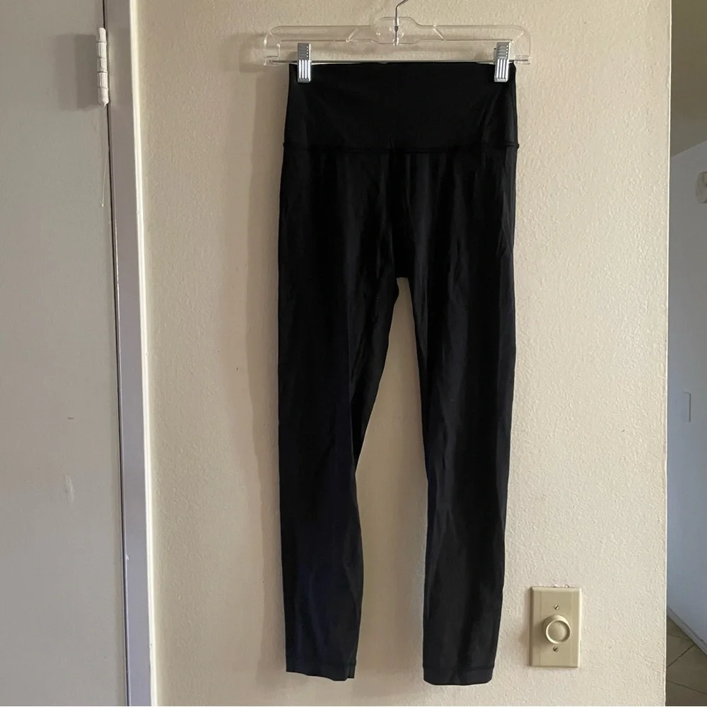 Lululemon black leggings size 4